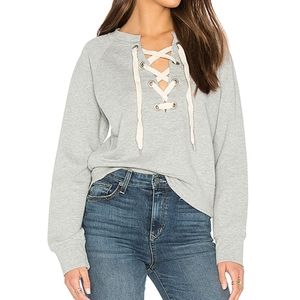 Sincerely Jules
Kaia
front lace sweatshirt

Size S